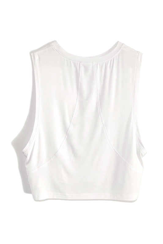 Soft bamboo fabric in a cooling loose, crop fit.  Perfect for in or out of the gym or on the yoga mat!  In white with a printed chambray blue Mongoose logo on the front.